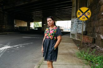 Ana Baptista, a community advocate, in Newark's Ironbound neighborhood. Credit: Brian Fraser/NBC News