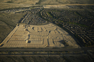 Construction continues on a new section for homes at Festival Ranch on Oct. 24, 2022 in Buckeye, Arizona. Credit: RJ Sangosti/MediaNews Group/The Denver Post via Getty Images