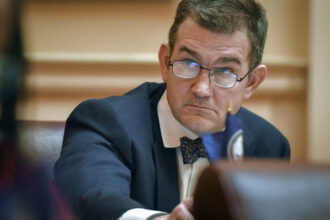 Virginia state Senator Chap Petersen at work in the statehouse. Credit: Bill O'Leary/The Washington Post via Getty Images.