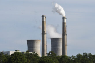 The Stanton Energy Center, a coal-fired power plant, is seen in Orlando. Credit: Paul Hennessy/SOPA Images/LightRocket via Getty Images