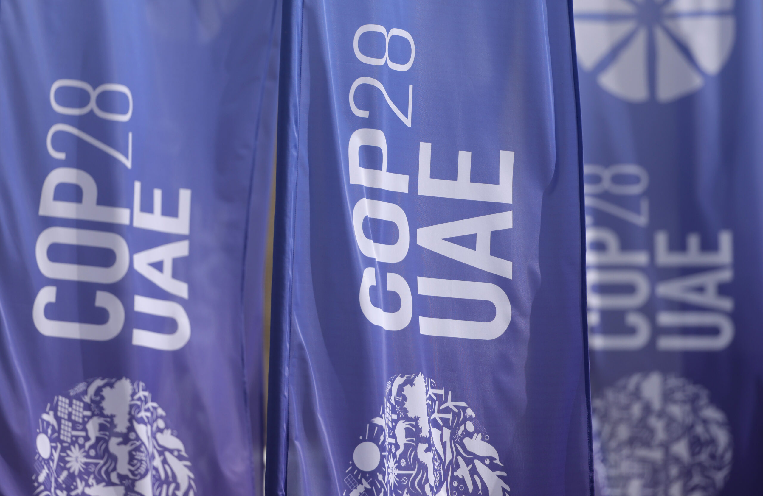 Banners fly at the UNFCCC COP28 Climate Conference in Dubai, the United Arab Emirates, before its official opening on Thursday. Credit: Sean Gallup/Getty Images