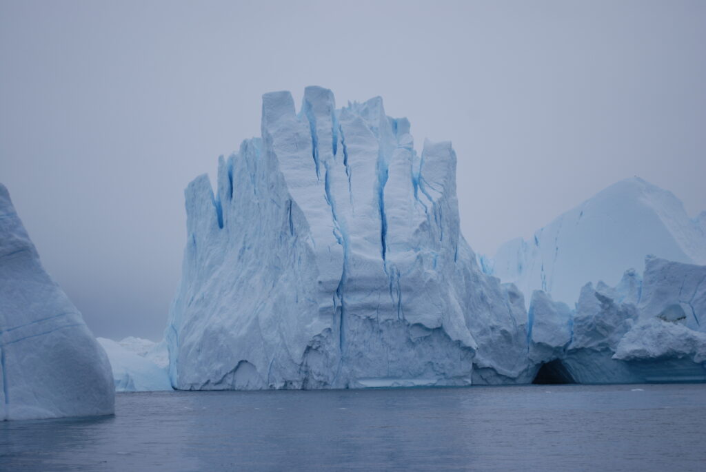 Calved ice blocks from the Ilulissat Icefjord, visible from Disko Bay on Sept. 6, 2022. Due to climate change, the ice sheet has dramatically retreated every year. Credit: Natasha Jessen-Petersen
