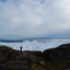 A tourist at the Ilulissat Icefjord, a UNESCO World Heritage site, on Sept. 7, 2022. The ice there has been dramatically receding from year to year. Credit: Natasha Jessen-Petersen