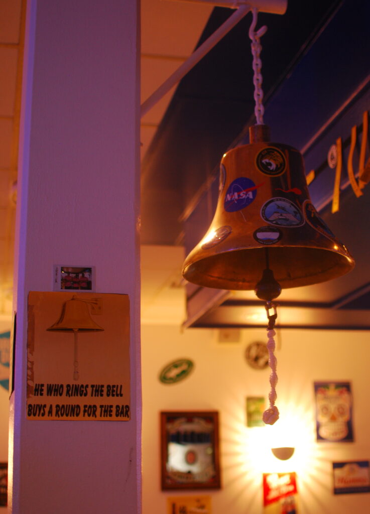 The bell in front of the bar at Top of the World Club, Thule Air Base's only bar. Credit: Natasha Maki Jessen-Petersen 