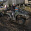 Pauly Andy transports people and belonging using an all-terrain vehicles in Newtok, Alaska, where melting permafrost, sinking tundra and flooding disturbed the boardwalks on October 9, 2019. Credit: Bonnie Jo Mount/The Washington Post via Getty Images