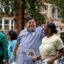 Illinois Governor JB Pritzker and Lieutenant Governor Juliana Stratton walk in the 93rd annual Bud Billiken Parade, held on King Drive in Chicago, Illinois, on August 13, 2022.