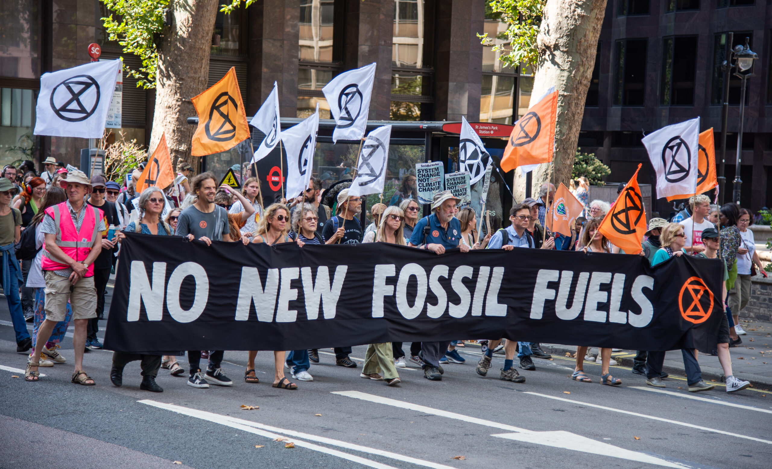 Protestors carry a large banner on Sept. 16, 2023 during the March To Demand An End To Fossil Fuels. Extinction Rebellion organizers mentioned that thousands of people joined marches across the UK in September as part of the global days of action demanding that leaders rapidly phase out fossil fuels. The demonstrators will call out the government for seeking to ‘max out’ North Sea oil and gas reserves despite warnings that there can be no new drilling if the world is to stay within habitable climate limits. The UK government is giving out hundreds of new North Sea licenses and has voiced its support for the proposed development of the huge Rosebank oil field off the Scottish coast. Credit: Loredana Sangiuliano/SOPA Images/LightRocket via Getty Images