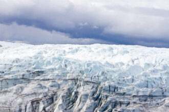 The Greenland Ice Sheet, which has enough frozen water to raise sea levels by 20 feet, melted away completely at least once about 1 million years ago, new research shows. Credit: Joshua Brown