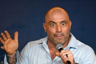 Comedian Joe Rogan performs during his appearance at The Ice House Comedy Club on April 17, 2019 in Pasadena, California. Credit: Michael S. Schwartz/Getty Images