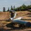 Sections of the Enbridge Line 3 pipeline on the construction site on the White Earth Nation Reservation near Wauburn, Minnesota in June 2021. Credit: Kerem Yucel/AFP via Getty Images