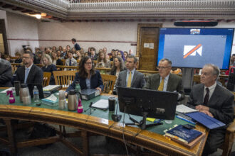 In Helena, Montana, the legal team representing Our Children's Trust in June at the nation's first youth climate change trial in Montana's First Judicial District Court. (L-R) Barbara Chilcoot, Nat Bellinger, Phil Gregory and Roger Sullivan. Sixteen claimants, ranging in age from 6 to 22, are suing the state for promoting fossil fuel energy policies that they say violate their constitutional right to a "clean and healthful environment." Credit: William Campbell/Getty Images.