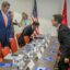 Former Secretary of State John Kerry and Chinese Deputy Minister of Environmental Protection Zhai Qing arrive for a bilateral meeting on the sidelines of the 28th Meeting of the Parties to the Montreal Protocol in Kigali on October 14, 2016. Credit: Cyril Ndegeya/AFP via Getty Images