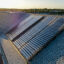 A new residence hall at Creighton University has a solar water heater. Pictured is one of two groups of solar collectors on the roof. Credit: Naked Energy