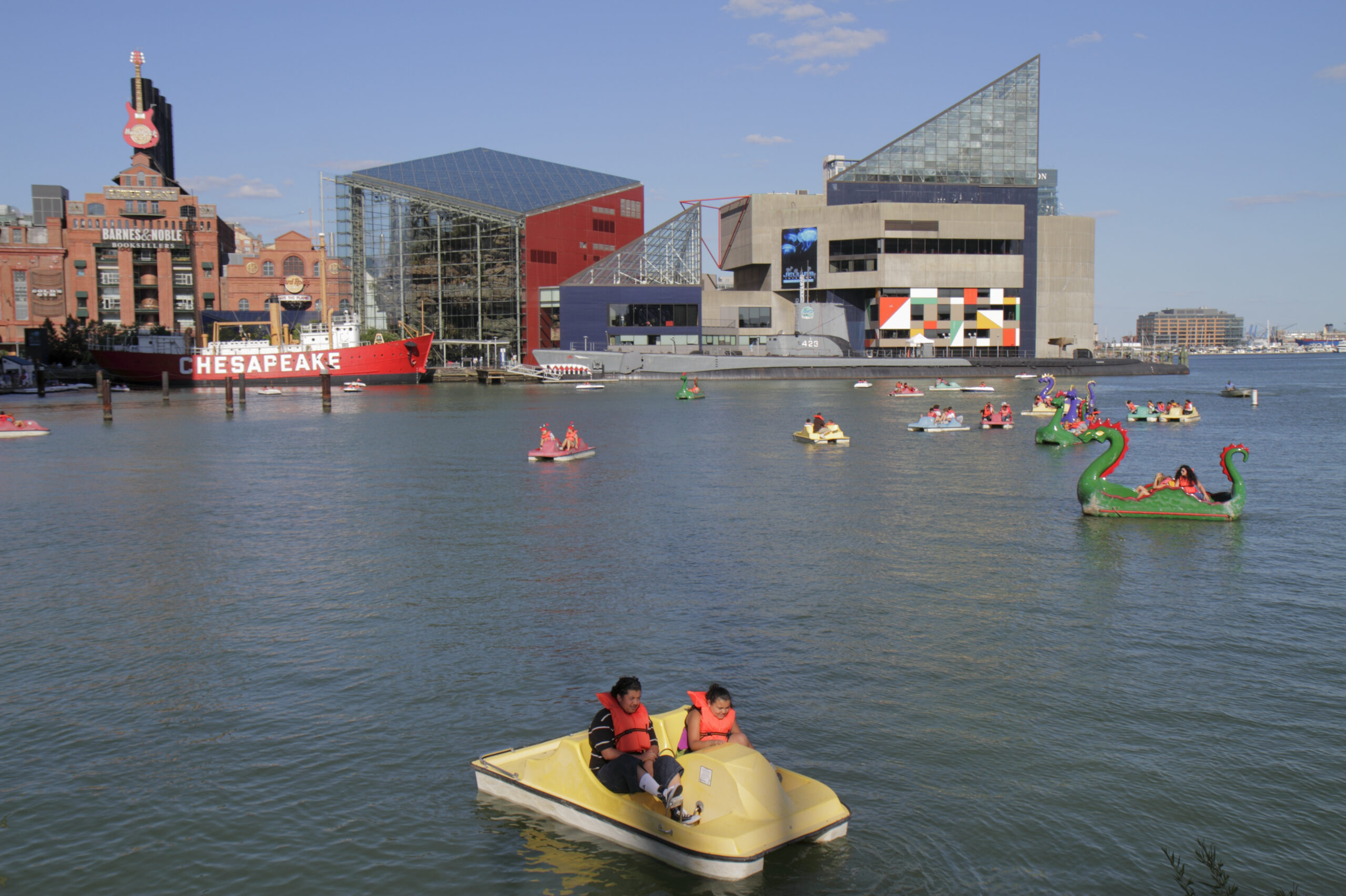 Paddle boat ride on the Patapsco River in Baltimore. The settlement agreement mandating upgrades at the city's Patapsco and Back River wastewater treatment plants also requires public notification if raw sewage is discharged so people can make informed choices about fishing, swimming or recreating in waters near the plants. Credit: Jeffrey Greenberg/Universal Images Group via Getty Images