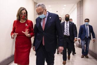 Speaker of the House Nancy Pelosi (D-Calif.) and Senate Minority Leader Chuck Schumer (D-N.Y.) speak after a press conference on Capitol Hill on Dec. 20, 2020 in Washington, D.C. Credit: Tasos Katopodis/Getty Images