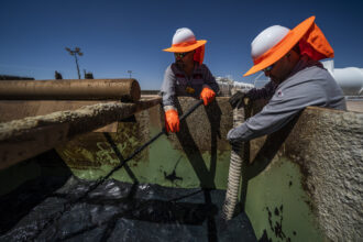 In a 2018 file photo, workers in Midland, Texas, extracting oil from oil wells in the Permian Basin. Credit: Benjamin Lowy/Getty Images.