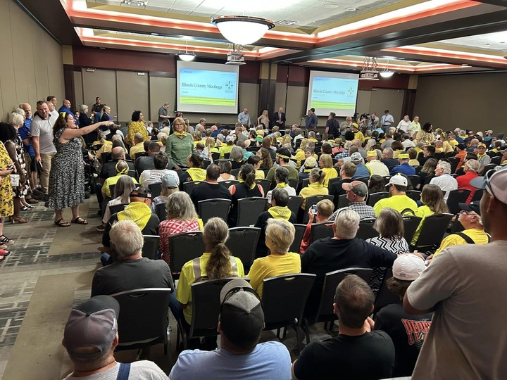 Hundreds of landowners pack the Bank of Springfield Convention Center on July 17 in Springfield, Illinois, for a public hearing about a carbon dioxide pipeline proposed by Navigator CO2 Ventures. The meeting was hosted by the Sangamon County Board, which voted on Aug. 8 to expand an existing moratorium on CO2 pipelines to include sequestration sites. Credit: Hannah Lee Flath