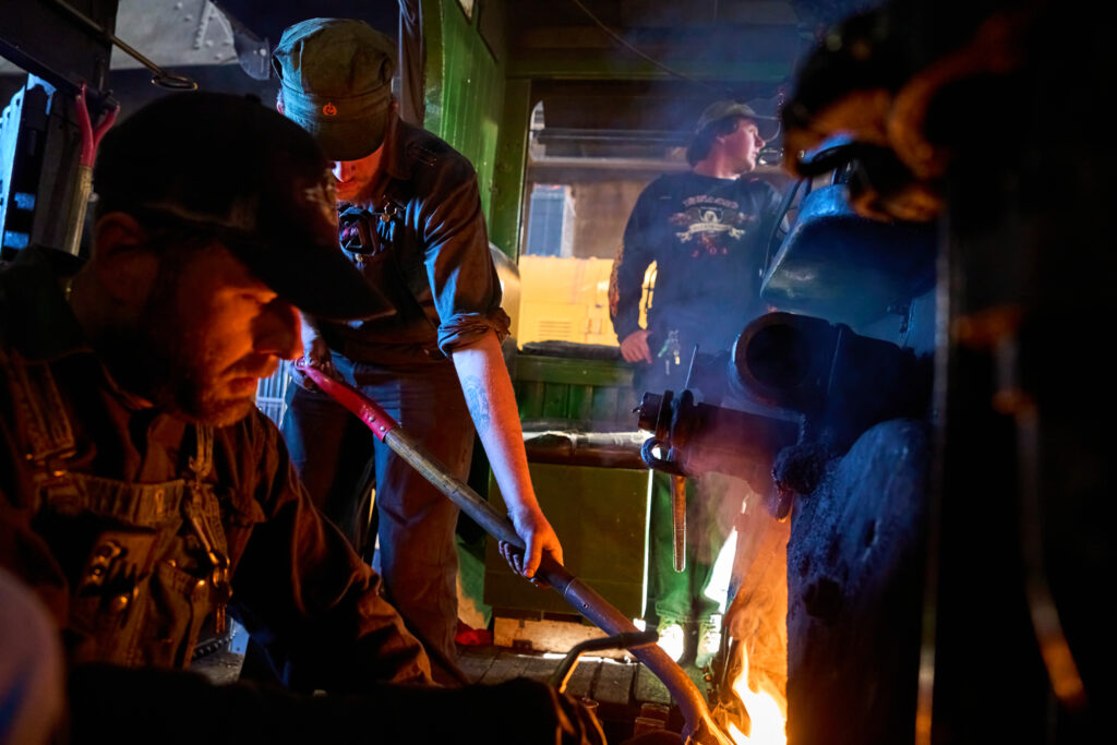 Railyard workers fire up a steam locomotive the day before it takes passengers for a ride in Ely, Nevada, on Thursday Oct. 5, 2023. Credit: Alex Gould