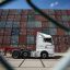 Shipping containers behind a fence at the Southampton docks in the UK. Credit: Matt Cardy/Getty Images