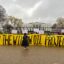 Holding a banner opposing the Willow oil project in Alaska, demonstrators gathered on Friday to urge President Biden to reject the proposal. Credit: Aman Azhar/Inside Climate News.