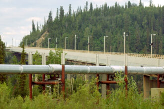 The Trans-Alaska Pipeline crosses the Yukon River July 21, 2002 near Dalton Highway in Fairbanks, Alaska. Credit: Barry Williams/Getty Images
