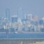 The city of Vancouver, British Columbia, is seen through a haze on a scorching hot day, June 29, 2021. Credit: Don MacKinnon/AFP via Getty Images