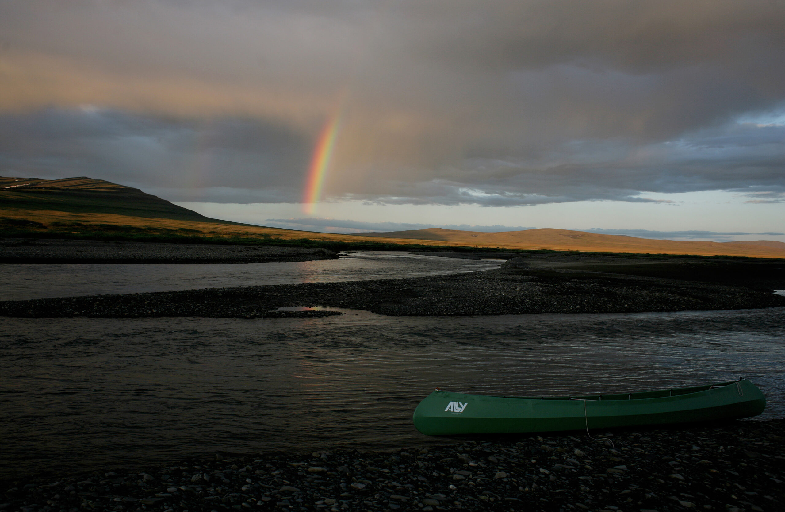 A rainbow touches down on the Kokalik River, in northwestern Alaska, winds its way through the National Petroleum Reserve. Credit: Andrew Lichtenstein/Corbis via Getty Images
