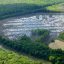 Little remains but stumps and puddles in what was once a bottomland hardwood forest on the banks of the Roanoke River in northeastern North Carolina. Credit: Joby Warrick/The Washington Post via Getty Images