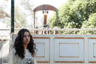 A pumpjack extracts crude oil just behind Yesinia Martinez's bedroom window. Martinez has had health problems, most linked to oil and gas extraction, since she was little. Credit: Liza Gross